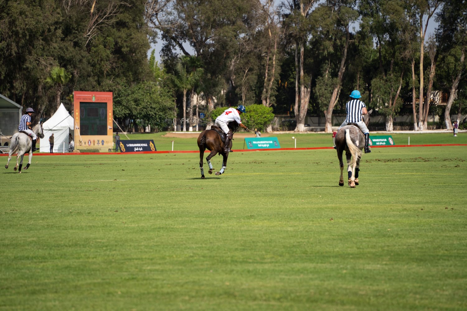 Player and umpire during the Throne Cup match